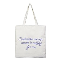 a tote bag that says don't wake me up crusading for me