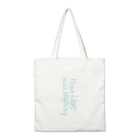 a white tote bag with a blue quote on it